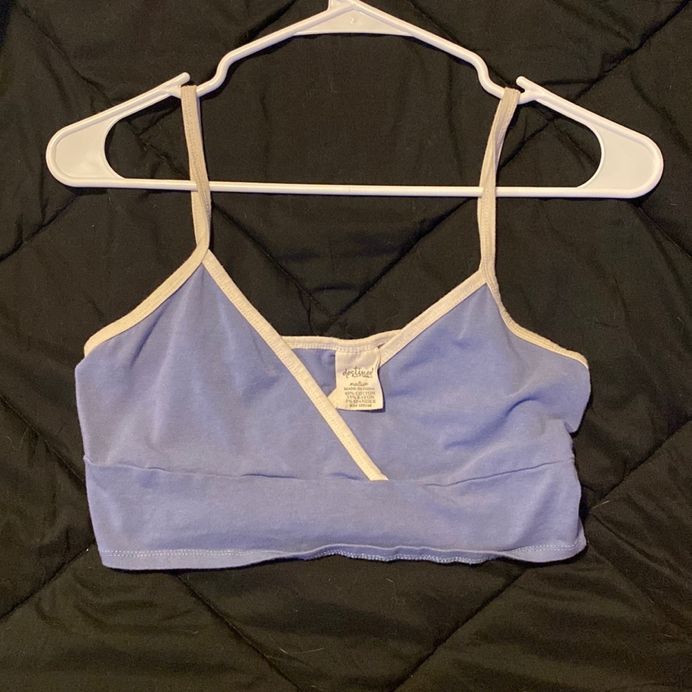 This could be worn many ways. As a shirt, under shirt, or as a comfy bra.